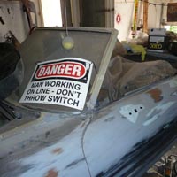 Danger, stupid men working.