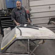 Skinning the top is Joe Donato, owner of East Coast Collision in Warwick, RI, and the man who first restored my Duetto in 1985