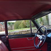 A view of the interior with matching seats, door panels, and headliner
