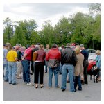 All heads are bowed as Peter reads the benediction before departing