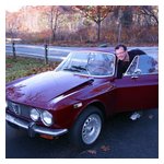 Popping the hood - he's smiling, so there must not be a problem