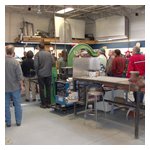Our group gathered in the metal fabrication shop