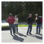 Alfisti engaged in various conversations, all wearing the official AONE uniform: blue jeans!
