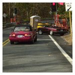 Dan tried to run the red light at a construction site and had to back up fast!