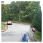 Alfas reflected in Peter Walker & Meg Anderson's Mini