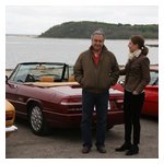 Jon Levi and Kay Tanfield behind their '92 Spider