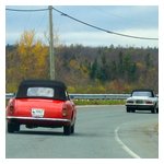 Roger and Karen Carlson's ’59 2000 Spider behind Tom Freiberger's 15-years-newer model