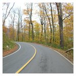 New pavement and tight turns up the north access road to Mt. Greylock- Alfa Heaven