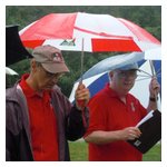 Andy sports his classic, collectible AONE umbrella, while Kevin uses one that works