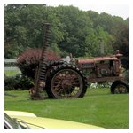 This tractor has probably been parked longer than the Alfa Spider a couple of photos back