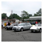 A few shots of the weather-defying Alfisti and their cars at the start in Westwood