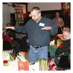 Michael Leccese attempts to divine the contents of the wrapped packages ...