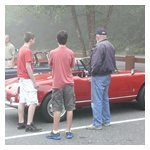 Tom Letourneau’s two grandsons, Cameron (L) and Sam, admiring Rod Burdick's Giulia.  Cam wound up as Rod's navigator and Sam navigated in a TR-3.