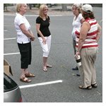 AONE gimmick rallye 'pros' and fellow competitors Deb Donovan and Judy Durso discussing the finer points of the art they have mastered to two of the BMCNE member's wives, this being their first-ever rallye