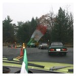 The flag of Italia reflected in the Dursos' windshield at the bottom of Wachusett
