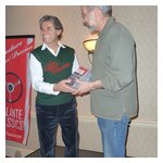 Andy accepting his autographed set of Victory by Design DVDs from Alain