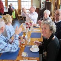 Some photos of the Crusaders relaxing at the tables we occupied at the Fish Monger Café in Woods Hole