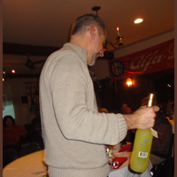 Roberto Rosa hangs onto his bottle of Limoncello