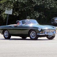 (Your webmaster's first sports car was a BRG MGB with wire wheels ... memories...)