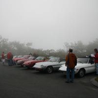Some photos of our fine machines as they gather in the mist at the summit of Mount Wachusett