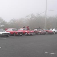 Some photos of our fine machines as they gather in the mist at the summit of Mount Wachusett
