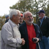 Frank Caruccio & Dave Pratt in a jovial moment before the leak is discovered