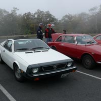 Some photos of our fine machines as they gather in the mist at the summit of Mount Wachusett