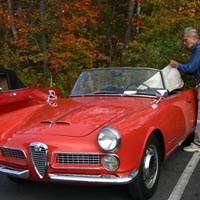 Roger Carlson lowers the top on his 1959 Touring 2000 Spider