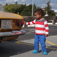 Axel Anigbo, the youngest Crusader, performs an equipment inspection on his dad's GTV 1750