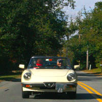 Tired Butt Award winners Glenn and Barbara Michael in their '83 Spider