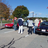 Crusade Commander Phil Bostwick summons the squadron for a brief drivers' meeting