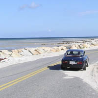 The Crusade battles its way through sand dunes led by Phil in his '72 GTV