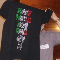 That's Doug Sondak behind his newly acquired 'Make Pasta, Not War' T-shirt