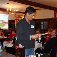 New AONE member John Feng makes his choice from the gift swap table