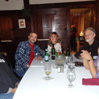 Some shots of the gang around our tables after dinner's been cleared