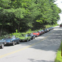 Thirteen Alfas departing Maine before being mistaken for construction vehicles (note bullet holes in sign)