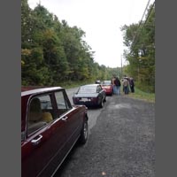 A few miles up the road, the rest of the pack pulls over to await Rich and the Alfisti who stopped to help