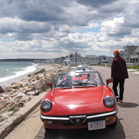 Our Alfas lined up in the No Parking zone along the ocean
