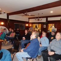 ... with the crowd listening in rapt attention
