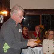 Jay Woodruff cracks open his prize