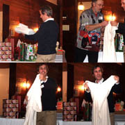 Peter Walker struggles to open the garment he unwrapped ... and never did succeed!