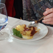 Spiga's wonderful signature dessert — Italian bread pudding with a secret glaze served with a scoop of gelato — divine!