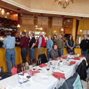 After enjoying antipasto and salad, the gang queues up at the buffet