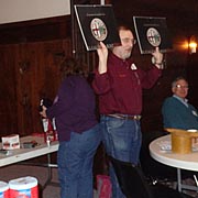 Tom Lesko holds up a pair of nice 2015 calendars (albeit not with New England Alfas)