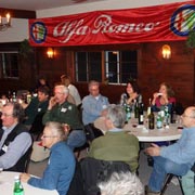 The crowd turns its attention toward the door prize table