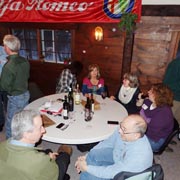 Some shots of the gang gathered around the tables