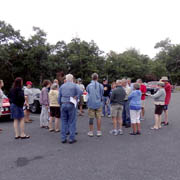 Deb & Dan Donovan gather the circumnavigators for the drivers' meeting