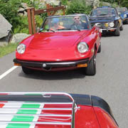 We mount up, coast on down the mountain, and here we are regrouping at the base. See that red Spider at the rear behind the lesser cars? The LoPrestis were driving UP the mountain as we were driving DOWN, spun around, and joined the pack!