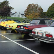 Our Alfas etc. arrive in a damp Patriot Square parking lot