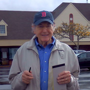 Always the optimist, Phil promises us clearing skies (he also wears a Red Sox cap)